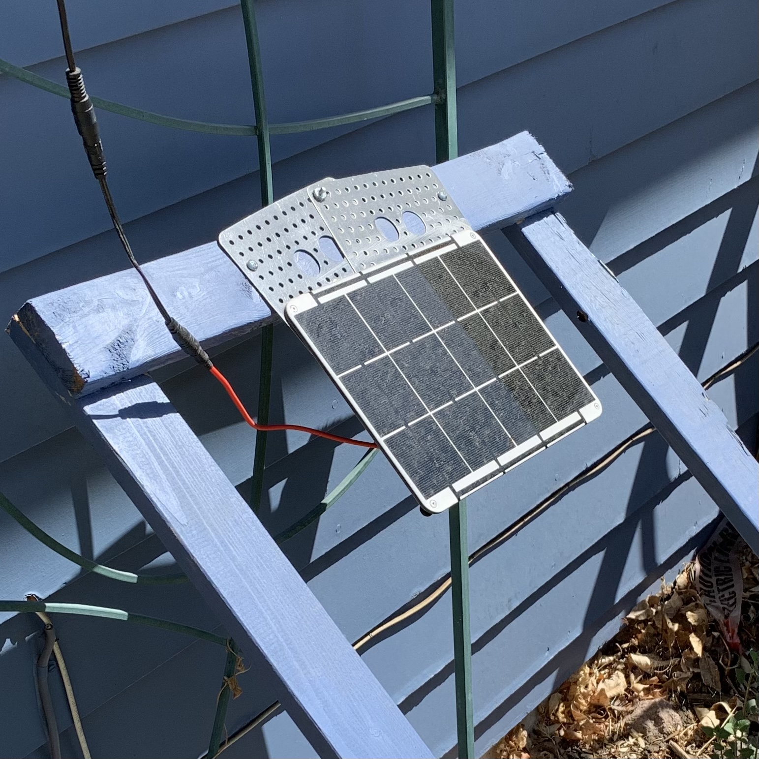 Solar panel on frame mounted at an angle